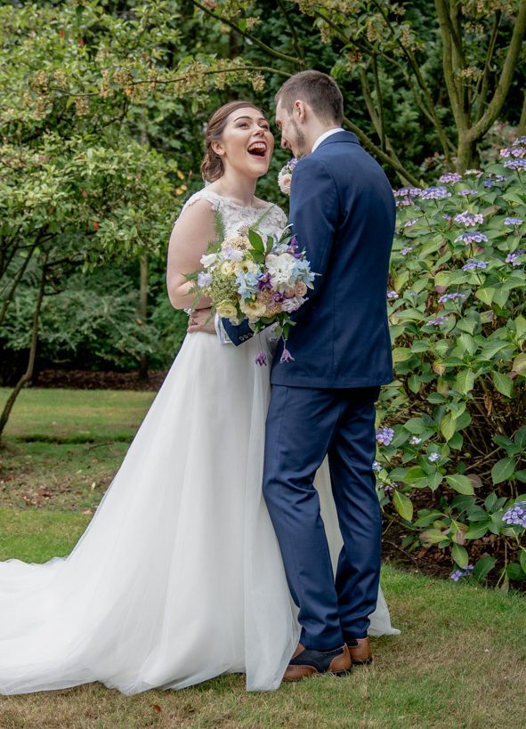 Bride and Groom portrait in the gardens at Nunsmere hall